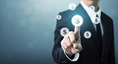 Businessman pointing dollar currency icon, Successful money financial investment concept