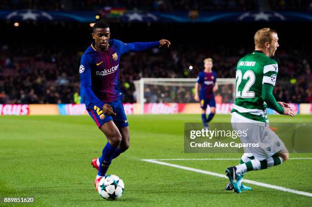 Nelson Semedo of FC Barcelona dribbles Jeremy Mathieu of Sporting CP during the UEFA Champions League group D match between FC Barcelona and Sporting...