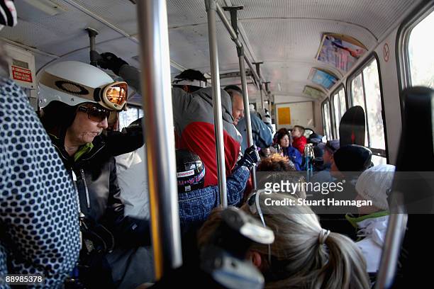 People pack onto a bus that takes people from Thredbo Village to Friday flat on July 7, 2009 in Thredbo, Australia. The snow busues help transport...