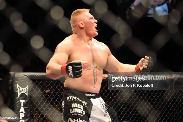 Brock Lesnar reacts after knocking out Frank Mir during their heavyweight title bout during UFC 100 on July 11, 2009 in Las Vegas, Nevada.