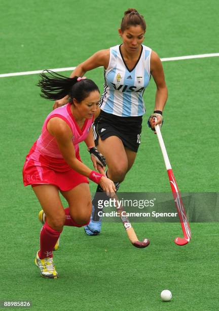 Hope Munro of the Hockyroos contests the ball with Soledad Garcia of Argentina during the Women's Hockey Champions Trophy match between the...