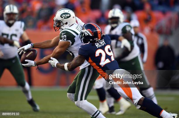 Denver Broncos free safety Bradley Roby breaks up a pass intended for New York Jets wide receiver Jermaine Kearse during the third quarter on...