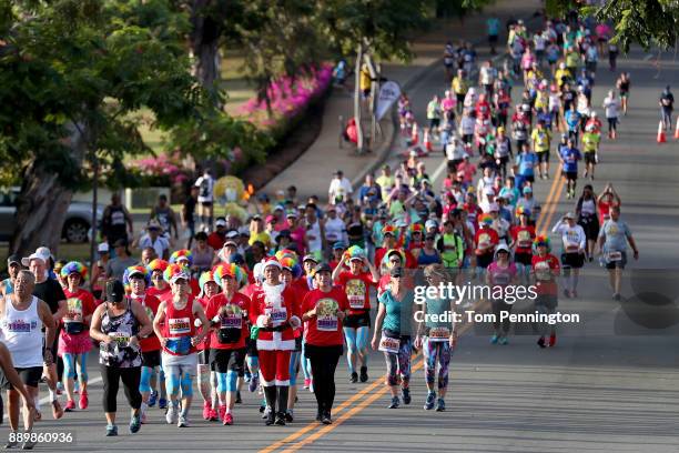 Participants run during the Honolulu Marathon 2017 on December 10, 2017 in Honolulu, Hawaii.