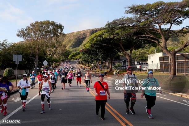 Participants run during the Honolulu Marathon 2017 on December 10, 2017 in Honolulu, Hawaii.