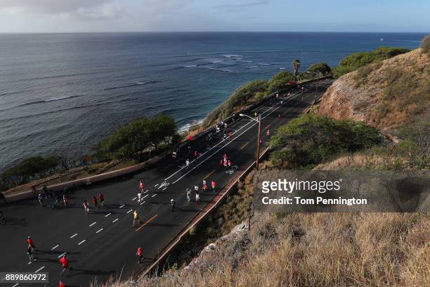 Participants run during the Honolulu Marathon 2017 on December 10, 2017 in Honolulu, Hawaii.