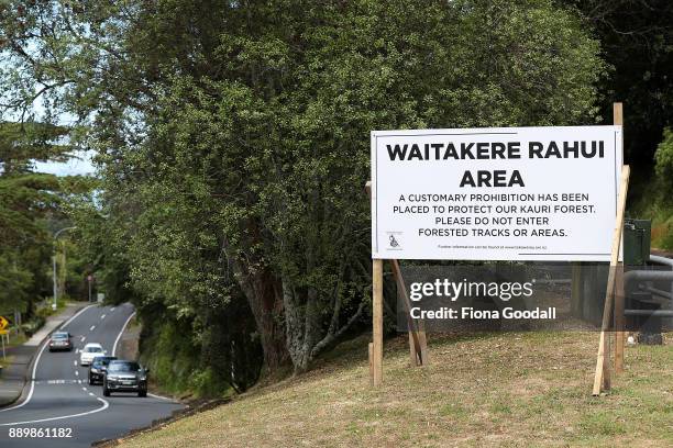 Rahui or customary prohibition sign in Titirangi, asks visitors not to enter tracks or forested areas in the Waitakere Ranges Regional Park on...