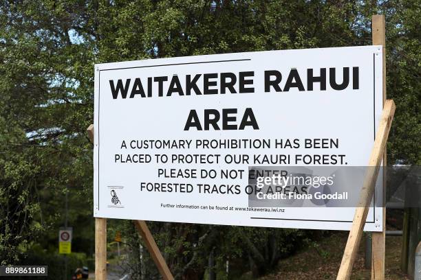 Rahui or customary prohibition sign in Titirangi, asks visitors not to enter tracks or forested areas in the Waitakere Ranges Regional Park on...