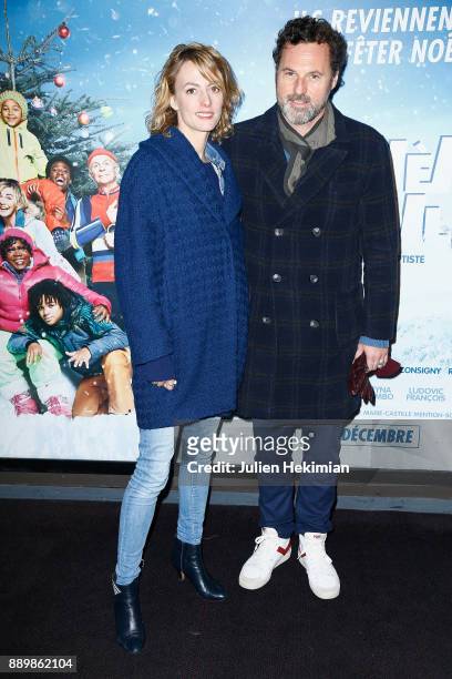 French actress Sara Mortensen and her boyfriend Bruce Tessore attend "La Deuxieme Etoile" Paris Premiere at UGC Cine Cite Bercy on December 10, 2017...