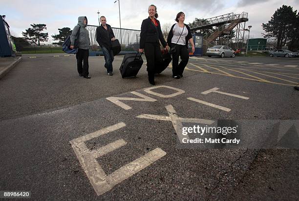 Royal Navy recruits arrive at the training establishment HMS Raleigh for the first day of their initial nine-week basic naval training on March 2...