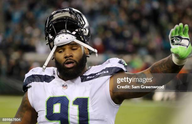 Sheldon Richardson of the Seattle Seahawks walks off the field during the second half of their game against the Jacksonville Jaguars at EverBank...