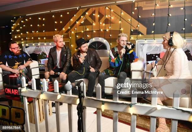 Sean Waugaman, Kevin Ray, Eli Maiman, and Nicholas Petricca of Walk the Moon speak to KROQ DJ Kat Corbett during an interview at KROQ Almost Acoustic...