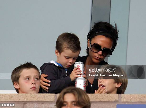 Victoria Beckham and her children at the Los Angeles Galaxy vs Chivas USA MLS match at The Home Depot Center on July 11, 2009 in Carson, California.