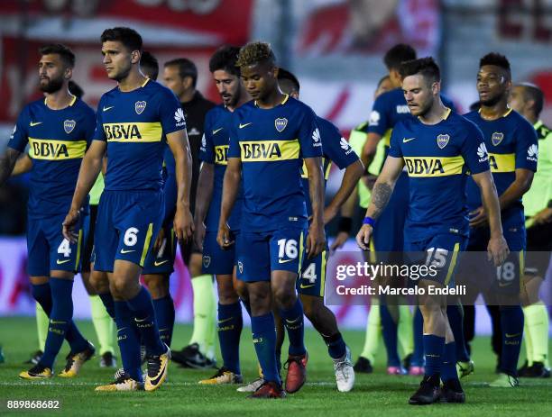 Players of Boca Juniors leave the field at the end of the first half during a match between Estudiantes and Boca Juniors as part of the Superliga...