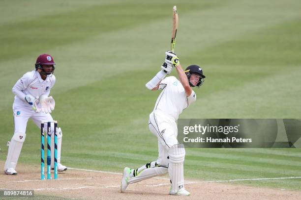 Mitchell Santner of New Zealand pulls the ball during day three of the Second Test Match between New Zealand and the West Indies at Seddon Park on...