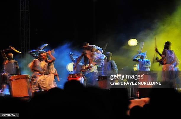 Dancers perform before Burundian musicians on July 11, 2009 during the second Pan-African Cultural Festival . Algeria is hosting the second at the...