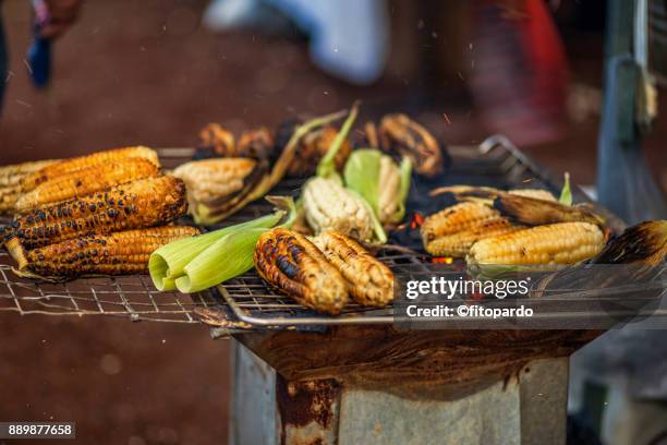 baked mexican street corn - mexico city street vendors stock pictures, royalty-free photos & images