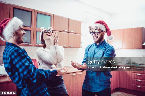 group of people having fun by throwing candy in the air - throwing cake stock pictures, royalty-free photos & images