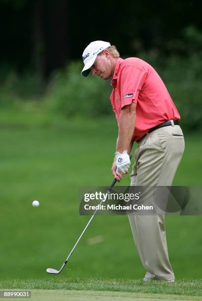 Steve Stricker of the USA plays a chip shot on the 15th hole during the third round of the John Deere Classic at TPC Deere Run held on July 12, 2009...