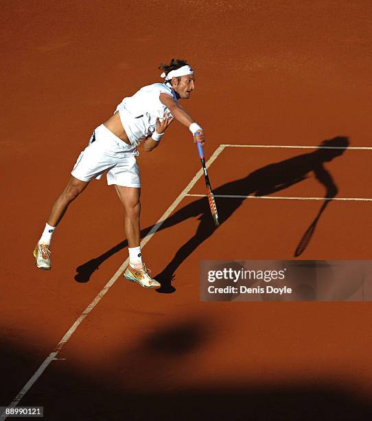 Juan Carlos Ferrero cerves to Andreas Beck of Germany in the quarter-finals of the Davis Cup World Group at the Plaza de Tores de Puerto Banus on...