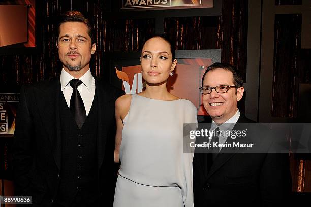 Actors Brad Pitt, Angelina Jolie and VH1 president Tom Calderone arrives on the red carpet at VH1's 14th Annual Critics' Choice Awards held at the...