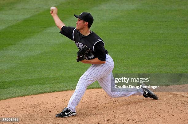 Relief pitcher Huston Street of the Colorado Rockies delivers against the Atlanta Braves in the ninth inning during MLB action at Coors Field on July...