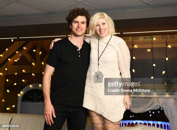Vance Joy poses with Kat Corbett at KROQ Almost Acoustic Christmas 2017 at The Forum on December 10, 2017 in Inglewood, California.
