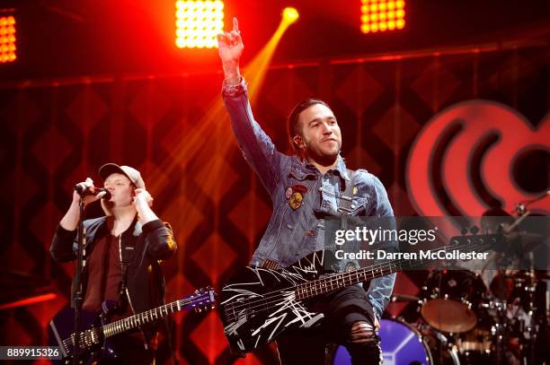 Patrick Stump and Pete Wentz of Fall Out Boy perform onstage during KISS 108's Jingle Ball 2017 presented by Capital One at TD Garden on December 10,...