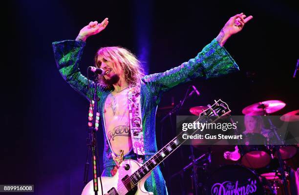 Justin Hawkins of The Darkness performs on stage at the Eventim Apollo on December 10, 2017 in London, England.