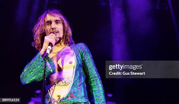 Justin Hawkins of The Darkness performs on stage at the Eventim Apollo on December 10, 2017 in London, England.