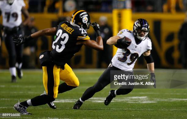 Danny Woodhead of the Baltimore Ravens runs up field after a catch in the first quarter during the game against the Pittsburgh Steelers at Heinz...