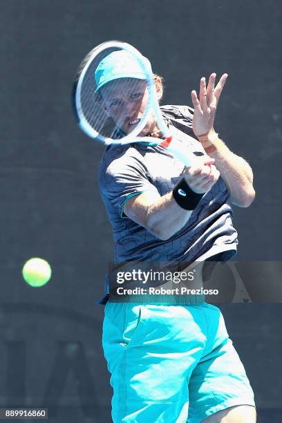 Maverick Banes of Australia competes against Matthew Barton of Australia in his first round Australian Open December Showdown match at Melbourne Park...