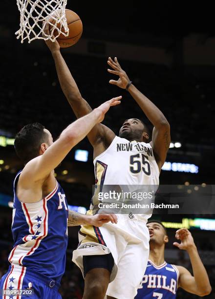Twaun Moore of the New Orleans Pelicans shoots against JJ Redick of the Philadelphia 76ers during the second half of a game at the Smoothie King...