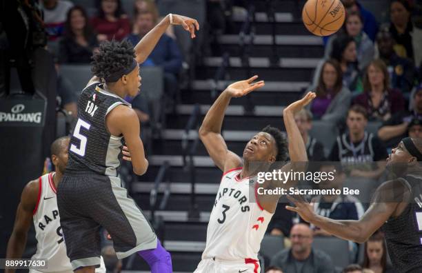 Sacramento Kings guard De'Aaron Fox throws away the ball while trying to pass to teammate Sacramento Kings forward Zach Randolph , marking his...