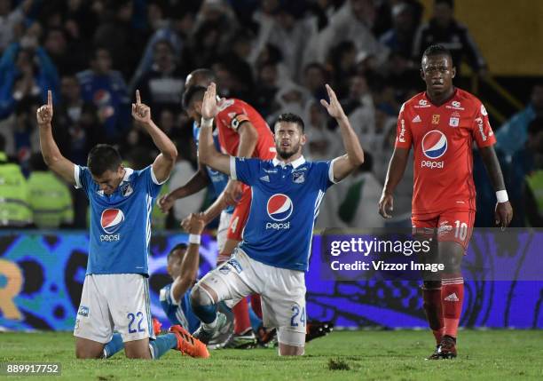 Jhon Duque Arias and Matias De Los Santos of Millonarios celebrate after the second leg match between Millonarios and America de Cali as part of the...