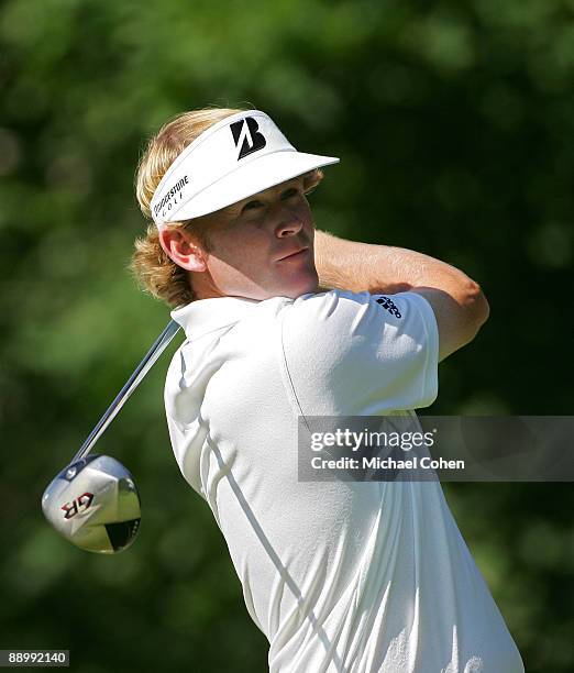 Brandt Snedeker of the USA hits his drive on the 15th hole during the final round of the John Deere Classic at TPC Deere Run held on July 12, 2009 in...
