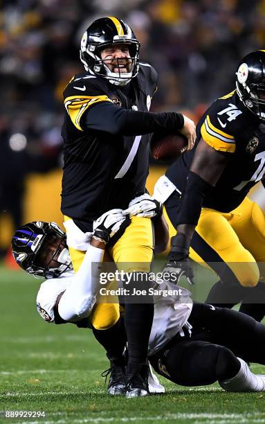 Ben Roethlisberger of the Pittsburgh Steelers is sacked by Tyus Bowser of the Baltimore Ravens in the second quarter during the game at Heinz Field...