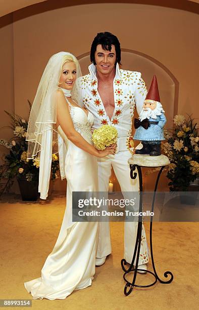 Holly Madison and the Travelocity gnome wed as Elvis impersonator Tim Welch officiates at The Wedding Chapel at Planet Hollywood Resort & Casino on...