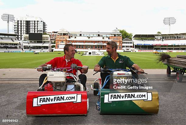Ashes legends Jason 'Dizzy' Gillespie of Australia and Phil 'Tuffers' Tufnell of England pose for pictures before the Betfair Lawnmower Challenge at...