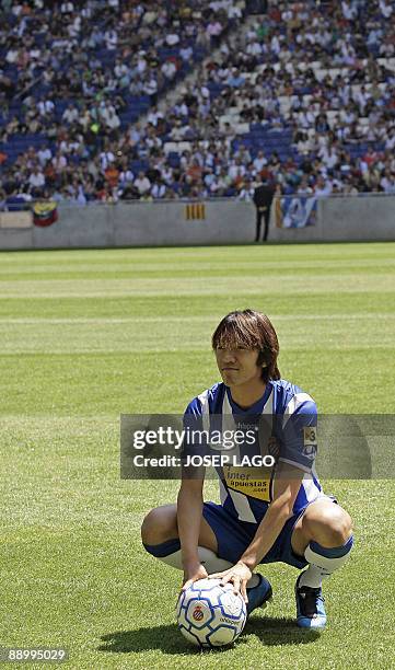 Espanyol's new player Japanese midfielder Shunsuke Nakamura poses during his official presentation in Barcelona, on July 13, 2009. Nakamura, who...