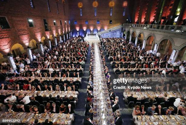 Photo taken on Dec. 10, 2017 shows a banquet sponsored by Sweden's King Carl XVI Gustaf for the 2017 Nobel Prize winners, held at Stockholm City...