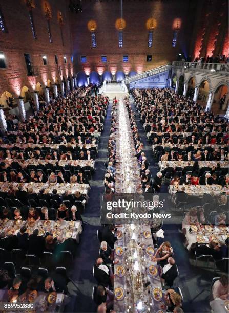 Photo taken on Dec. 10, 2017 shows a banquet sponsored by Sweden's King Carl XVI Gustaf for the 2017 Nobel Prize winners, held at Stockholm City...