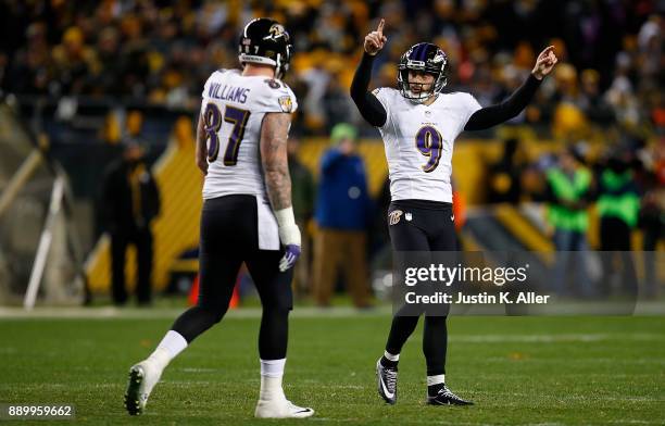 Justin Tucker of the Baltimore Ravens reacts after kicking a field goal in the third quarter during the game against the Pittsburgh Steelers at Heinz...