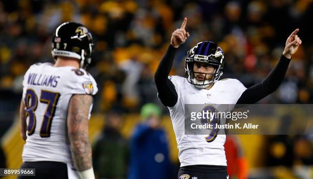 Justin Tucker of the Baltimore Ravens reacts after kicking a field goal in the third quarter during the game against the Pittsburgh Steelers at Heinz...