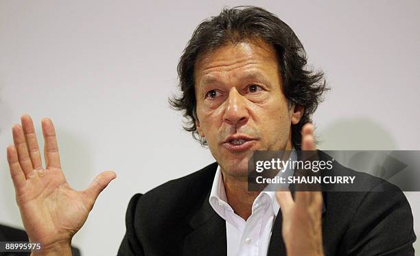 Former Pakistan cricketer and opposition politician Imran Khan talks to the media during a press conference in central London, on July 13, 2009....