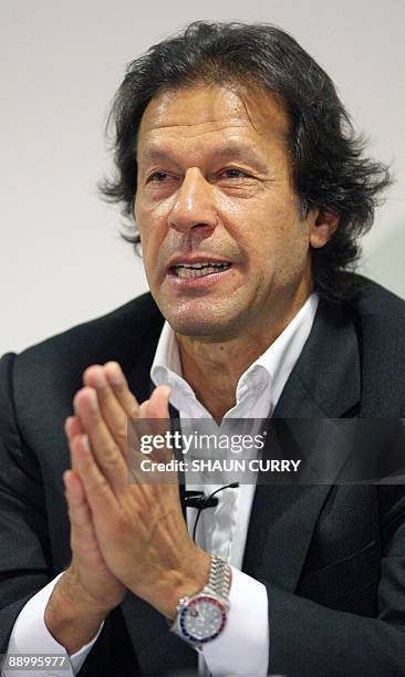 Former Pakistan cricketer and opposition politician Imran Khan talks to the media during a press conference in central London, on July 13, 2009....