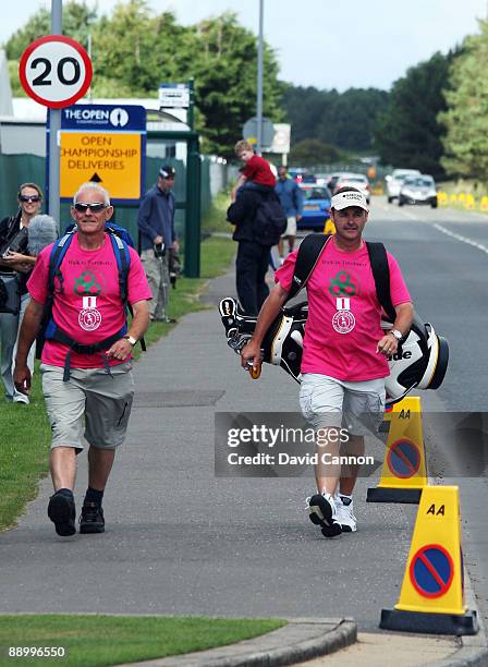 Billy Foster of England, Lee Westwood's caddie on his charity walk from Loch Lomond with his companion Stuart Hooley during the practice round of the...