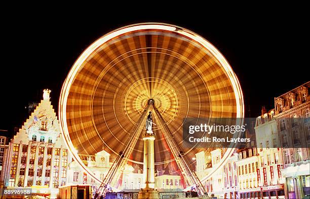 goddess and big wheel - lille france stock pictures, royalty-free photos & images