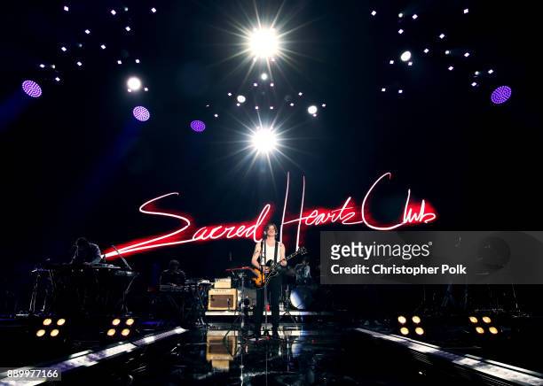Musical group Foster the People performs onstage during KROQ Almost Acoustic Christmas 2017 at The Forum on December 10, 2017 in Inglewood,...