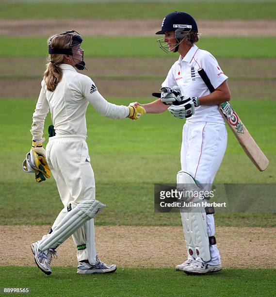 Charlotte Edwards of England shakes hands with her counterpart Jodie Fields after the draw on the 4th day of England Women v Australia Women 1st Test...