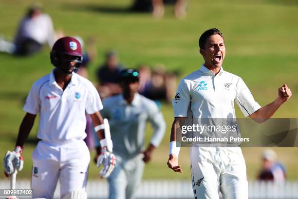 Trent Boult of New Zealand celebrates the wicket of Kieran Powell of the West Indies during day three of the Second Test Match between New Zealand...